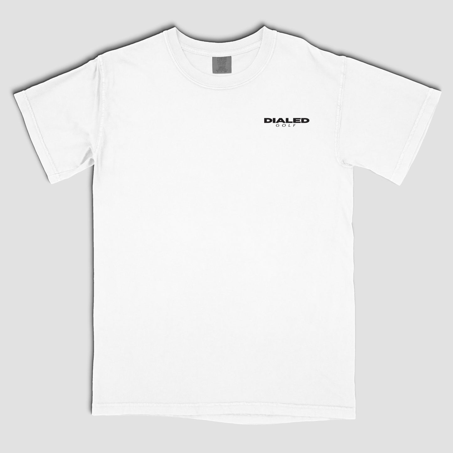 white Bomb Drives Not Countries Dialed Golf graphic tee with front logo design