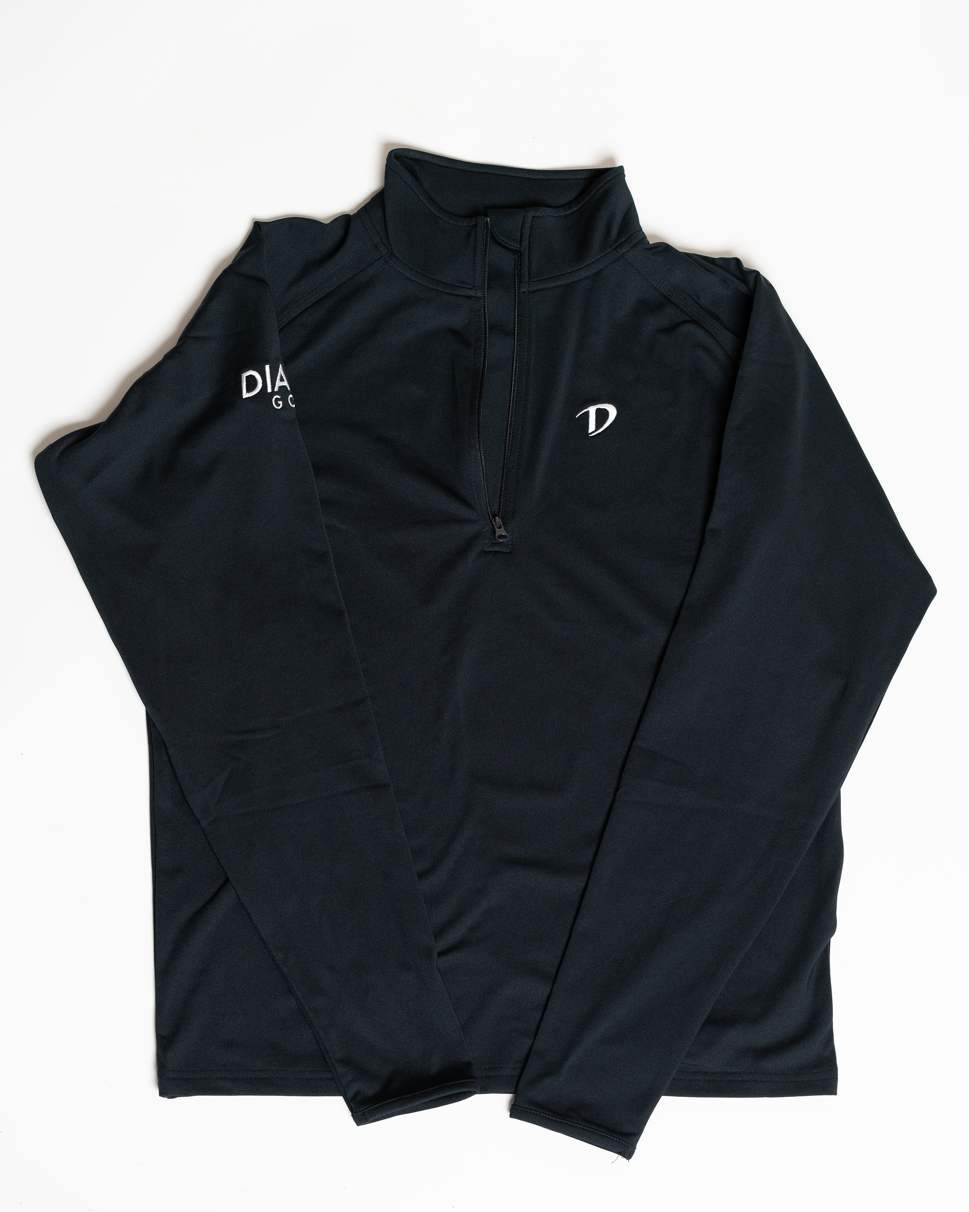 Front view of the Dialed Core™ Quarter Zip in black, featuring a clean, minimal silhouette and lightweight construction.