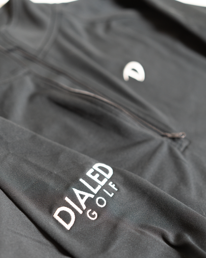 Side angle highlighting the breathable fabric, smooth quarter-zip neckline, and relaxed unisex fit.