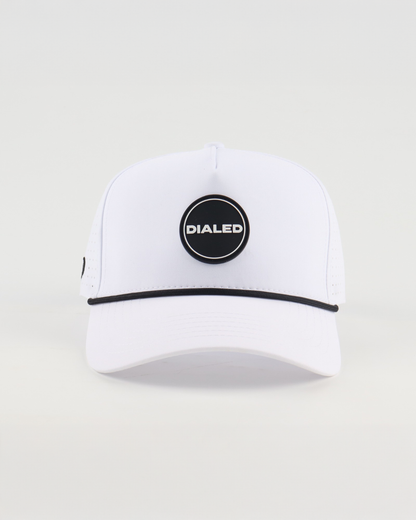 White performance rope golf hat with circular logo patch

White rope-style performance golf hat by Dialed Golf

Lightweight white golf hat with circular patch logo