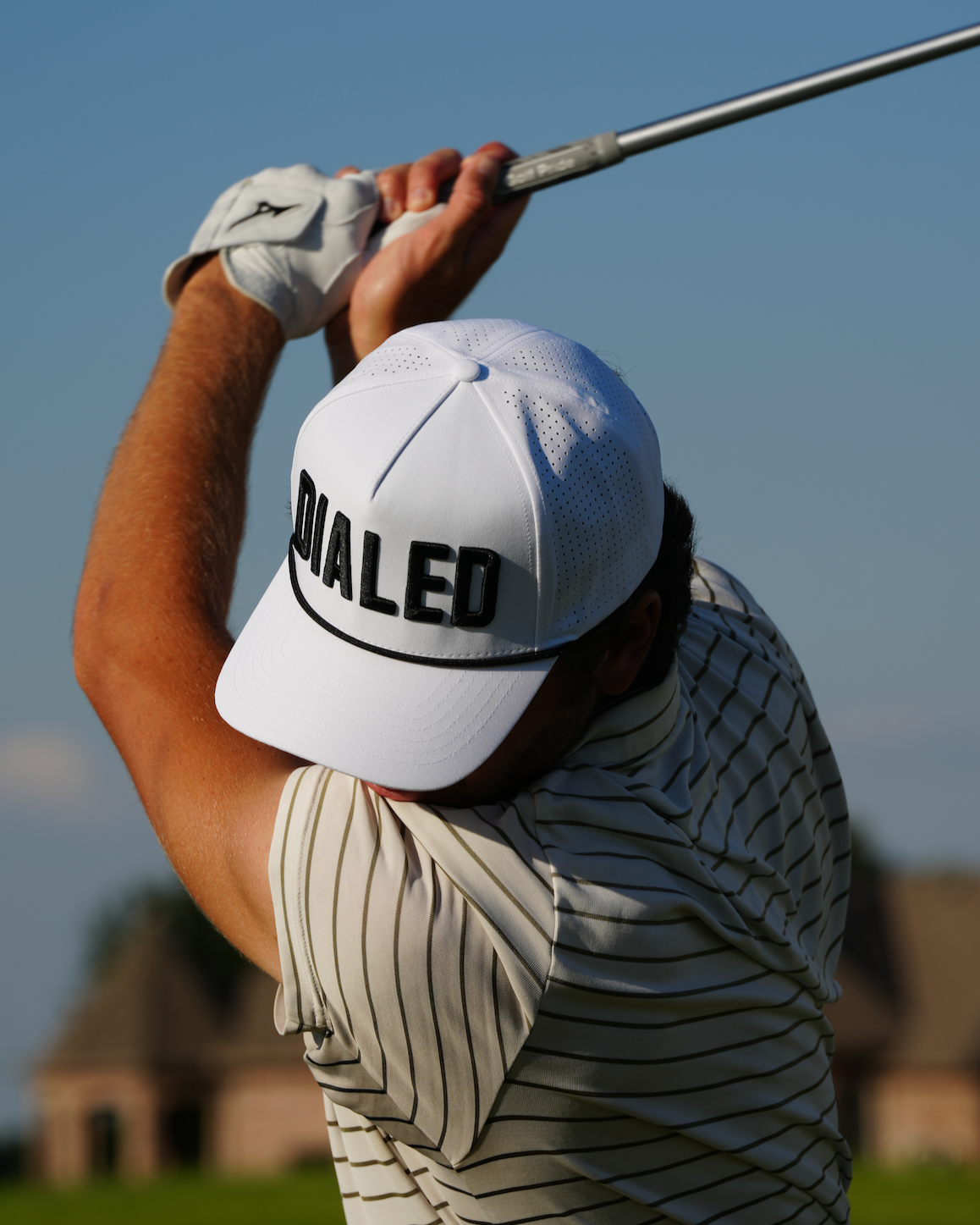 Side angle highlighting the classic rope detail, curved brim, and breathable construction.